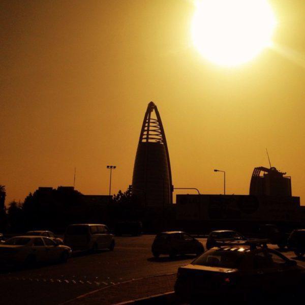 sun lowering over khartoum and red sky