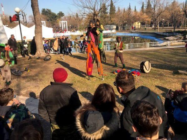 man on stilts in larissa city in greece