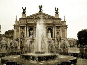 fountain in front of imposing building in lvov