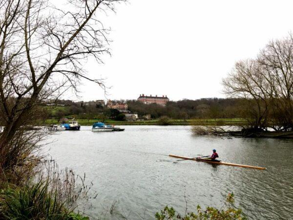 man kayaking in thames river in richmond