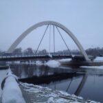 bridge with arch over emajogi river in tartu