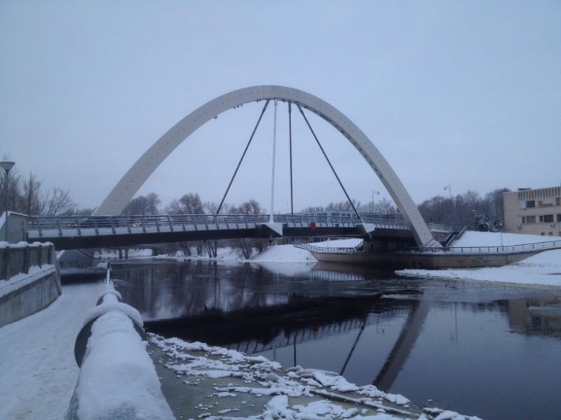 bridge with arch over emajogi river in tartu