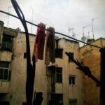 clothes pins in front of apartment buildings in thessaloniki