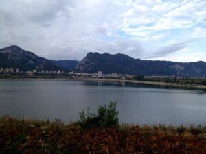 vratsa lake city and mountains under cloudy sky