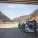 Under the bridge of wadi dayqah canyon oman road trip