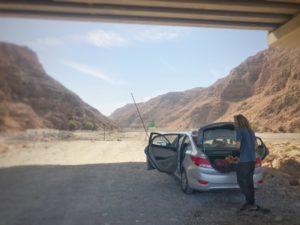 Under the bridge of wadi dayqah canyon oman road trip