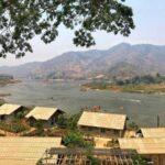 driving along the mekong river in thailand