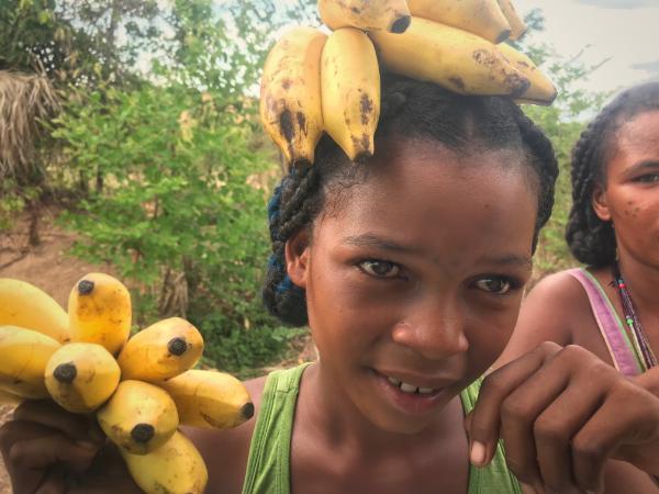 malagasy girl selling bananas during a madagascar road trip