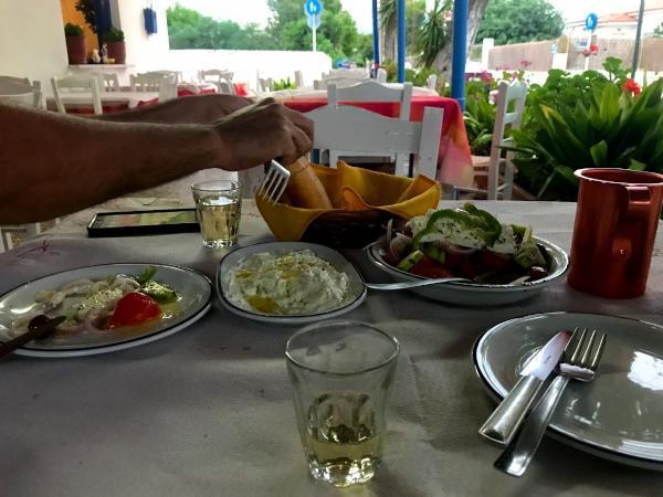 Delicious traditional Greece dinner and white to finish the day