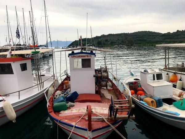 Fishing boats in the port of Old Epidauros in argolis greece 