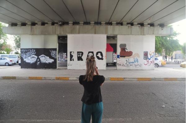 Photographing murals in Baghdad, Iraq
