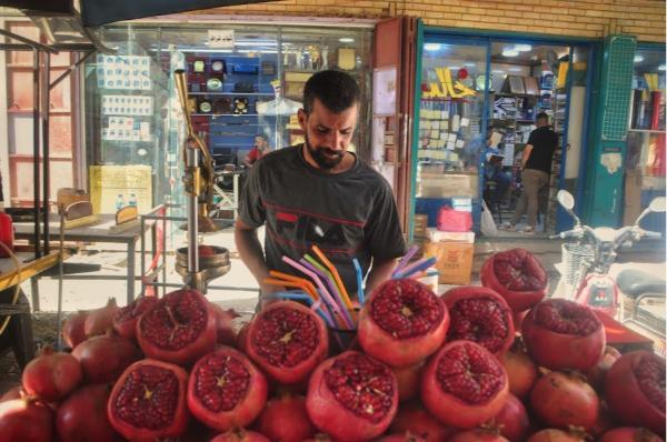 fresh pomegranate juice street stall in Baghdad, Iraq