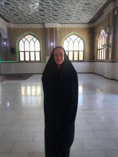 british girl wearing burka inside mosque in iraq