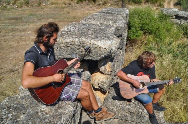 playing music in greece acnient site Fichti Block House