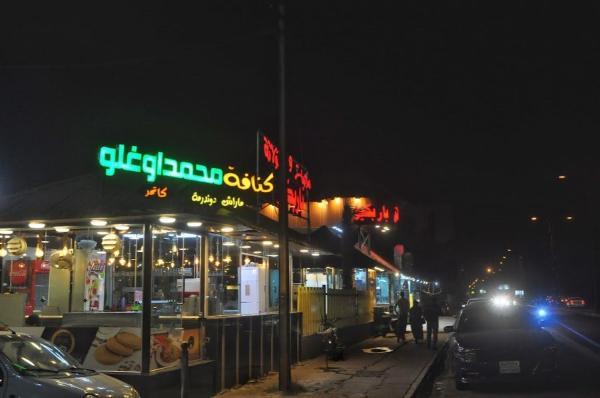 mosul lively street with restaurants at night