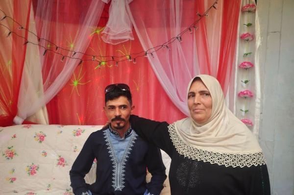 newly wed couple at local wedding in mosul, iraq