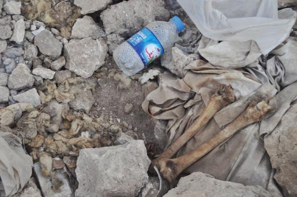 human bones on the rubble in mosul, iraq