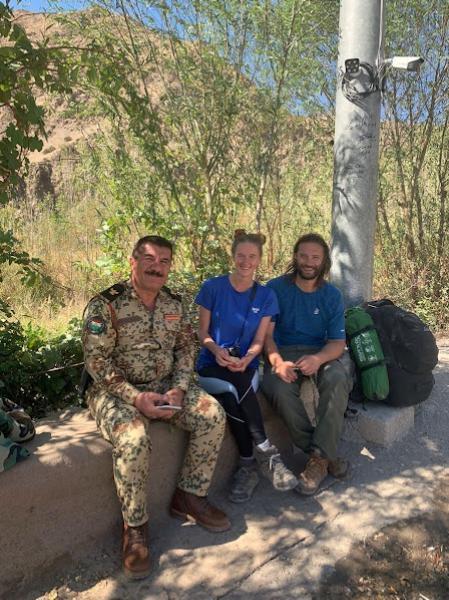 tourists with peshmerga soldier in iraqi kurdistan
