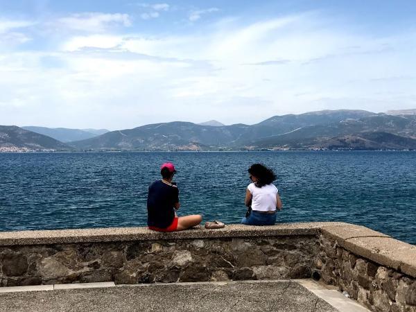 Staring at the sea and mountains from the port of nafplio greece