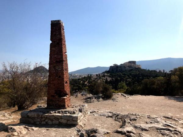 Brick pillar with the Acropolis in the background