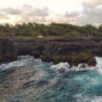 rough ocean on the coast of mauritius at pont naturel