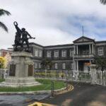 old building and statue in curepipe, mauritius