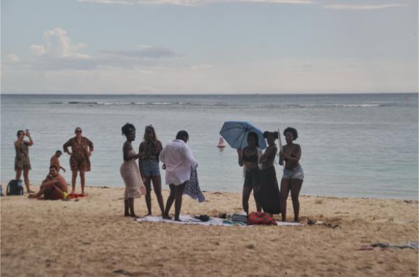 local mauritian girls having a photoshoot at flic en flac beach