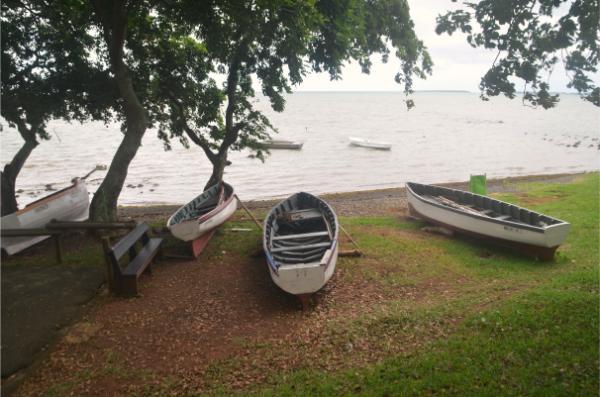 boats at old grand port beach, mauritius