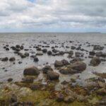 cloudy sky over rocky coast in old grand port, mauritius