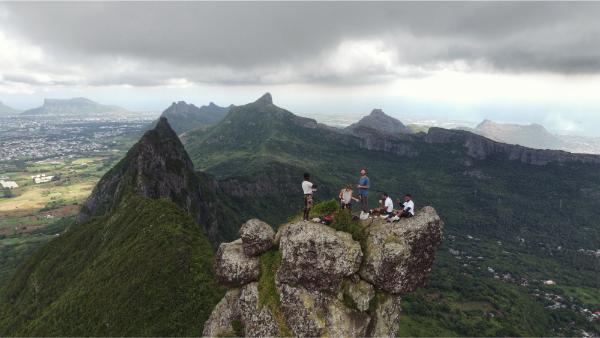 climbers on top of pieter both peak in mauritius