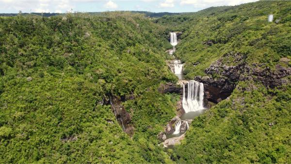 Distant aerial view of the tamarind 7 waterfalls from the viewpoint at Henrietta