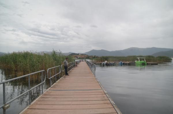 Floating bridge to agios achilleios island in prespa lake, greece