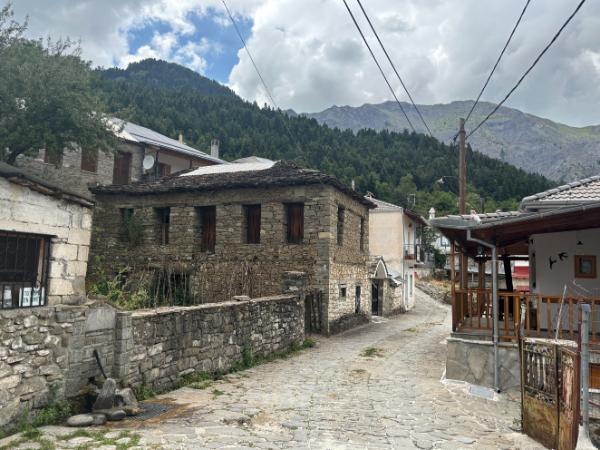 Driving through Plikati stone village in epirus, greece