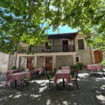 cute traditional tavern in central square of zygovisti village in arcadia region of peloponnese, greece