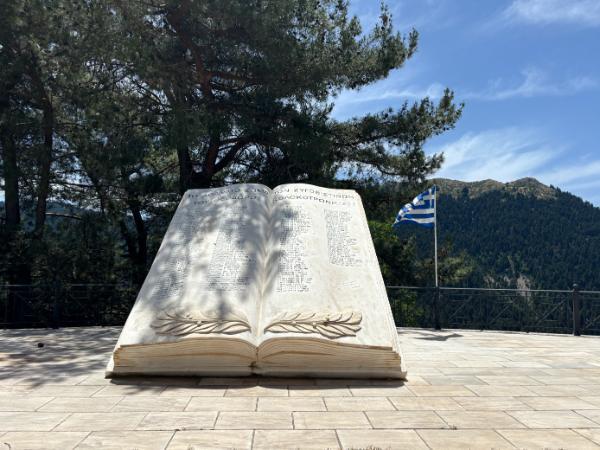 Book-shaped memorial in zigovisti village, mount menalon, greece