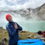 girl at misty morning ala kul lake in kyrgyzstan