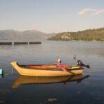 boat on orestiada lake shore in kastoria city