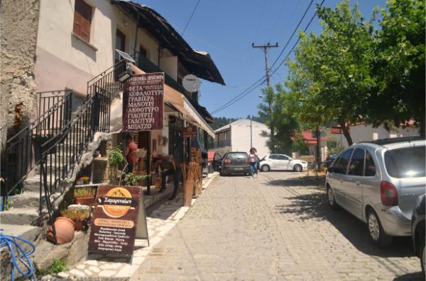 Traditional products shop on street in samarina village of greece