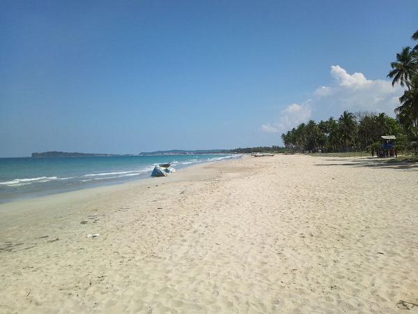 Vast sand expanse of Uppuveli beach in sri lanka