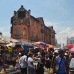 walking in analakely market, antananarivo, madagascar