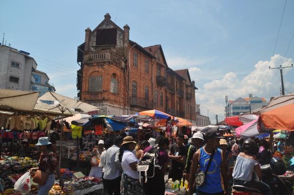 walking in analakely market, antananarivo, madagascar