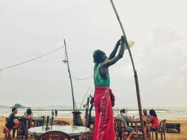 Eating fresh seafood at Weligama Beach, sri lanka