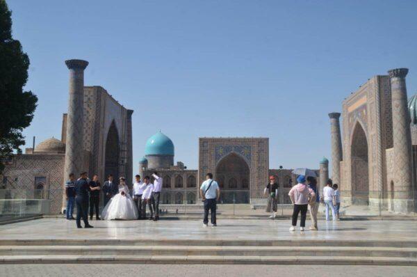 Wedding photoshoot with Registan Square in the background in samarkand