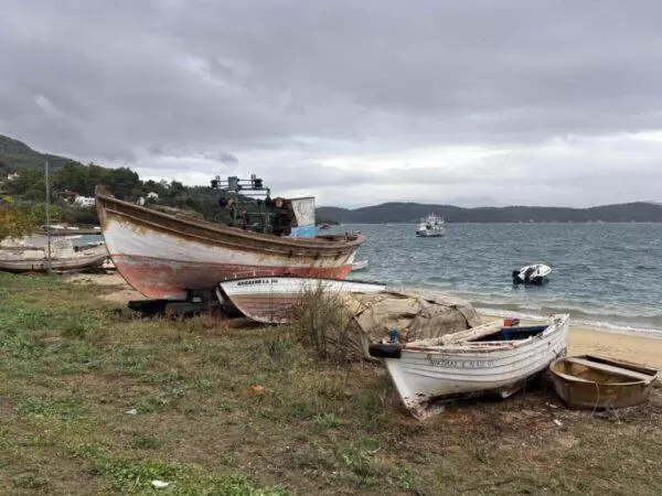 photo of fishing boats on the beach of agios georgios gialtron on euboea island, greece