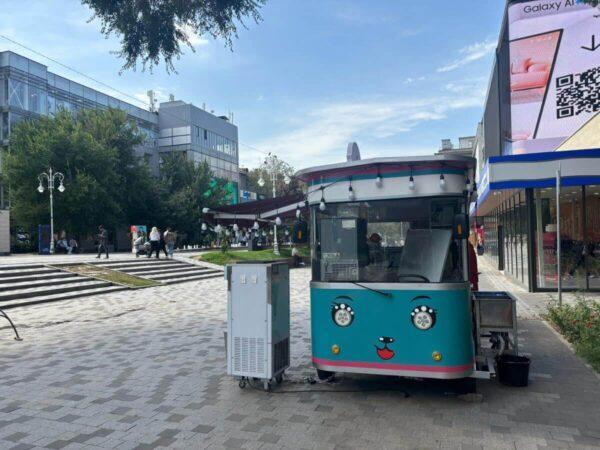 Cute mini ice cream cart on Zhibek Zholy Street in alma ata