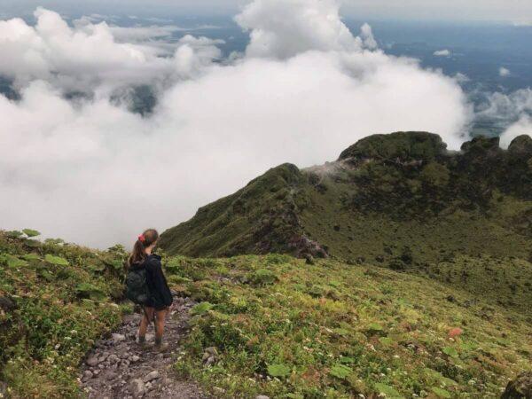 Starting on the way back down on hike to the top of arenal volcano in costa rica