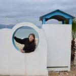 photo of girl at the beach village of asminio on euboea island, greece