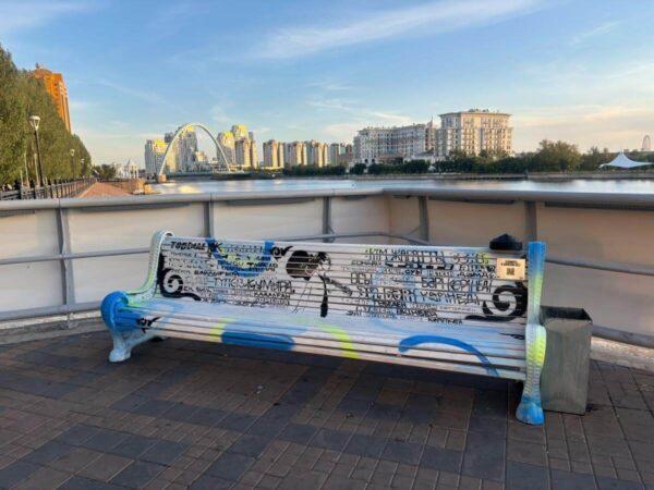 Cute bench with a nice view of the Embankment of the Ishim River in astana