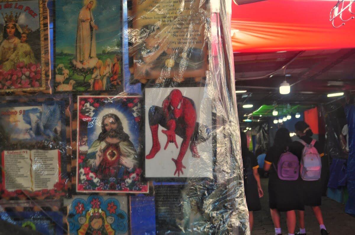 picture of jesus and spiderman next to each other