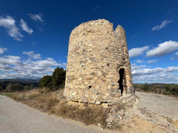 A smaller cylindrical tower in the village of Avlonari